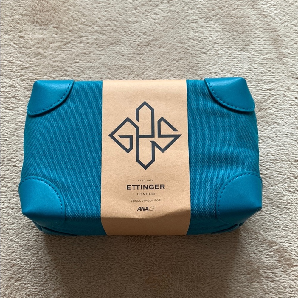 ETTINGER London cosmeic bag and Sensai skincare - blue